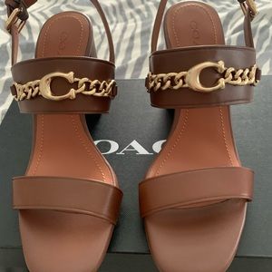 Ladies Coach leather heel.